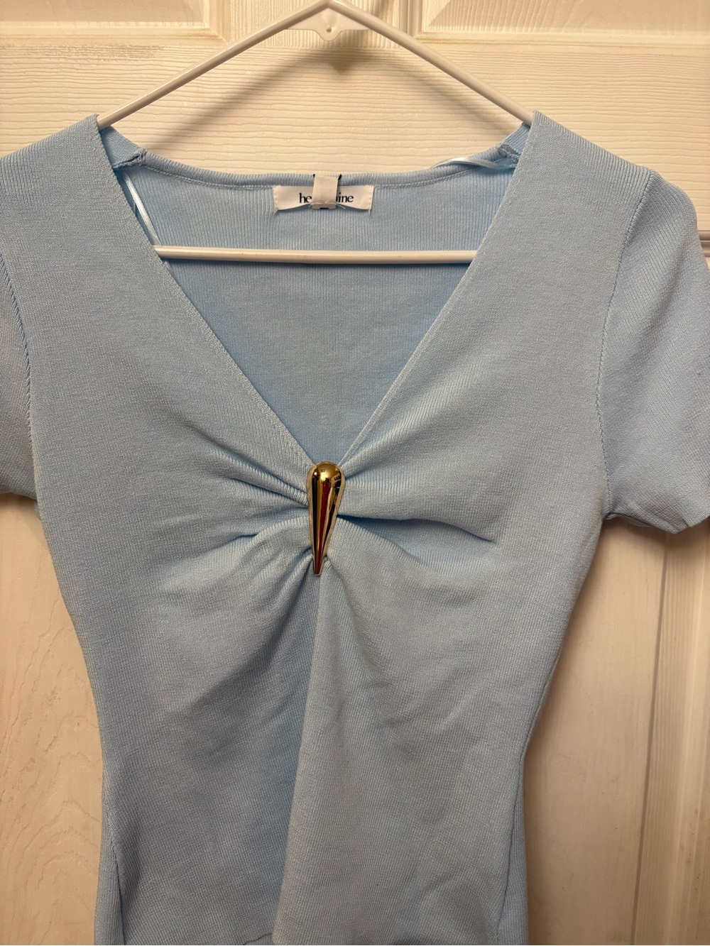 Light Blue V-Neck Knit Top with Gold Accent